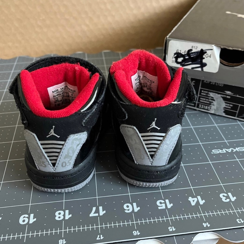 Jordans 
Size 4c

Lightly worn- baby was not walking.
Used for photo props